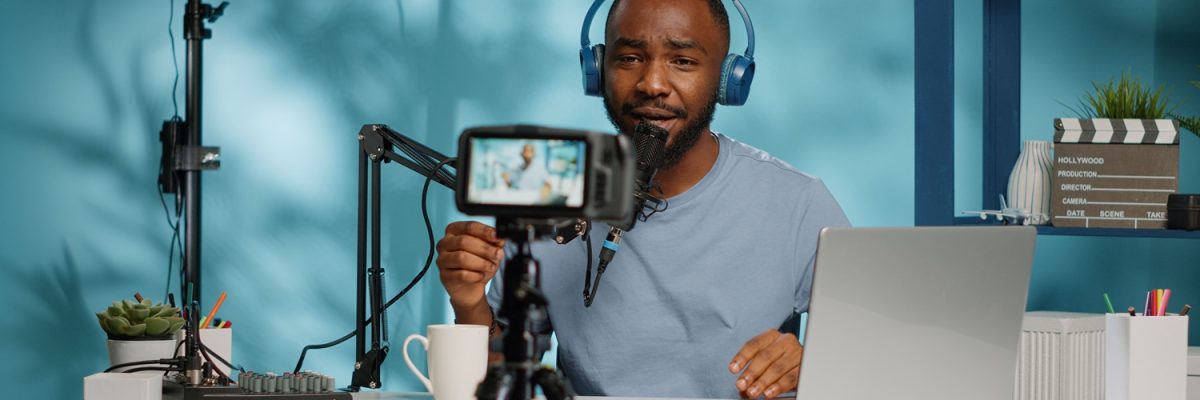 African American Vlogger Using Camera To Record Video - AM Contabilidade